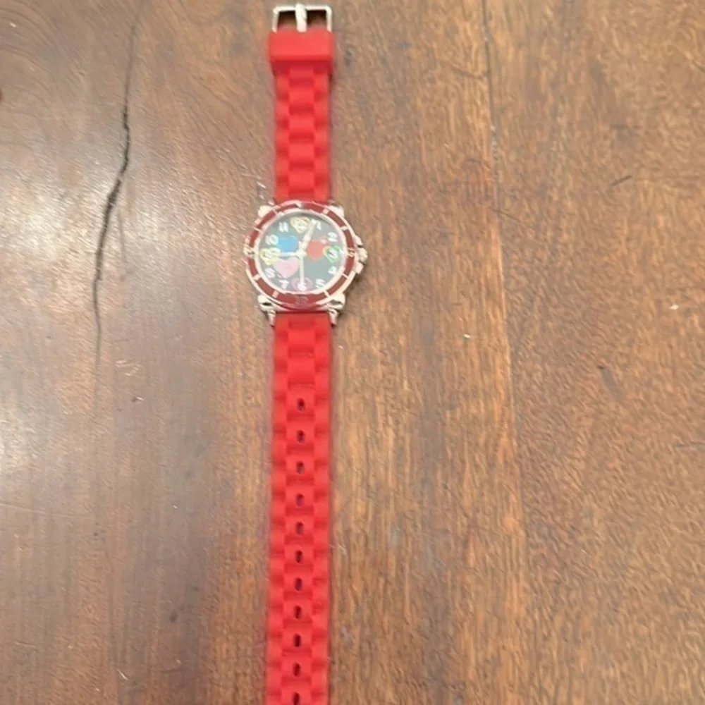 Ladies courts watch with pink silicone band